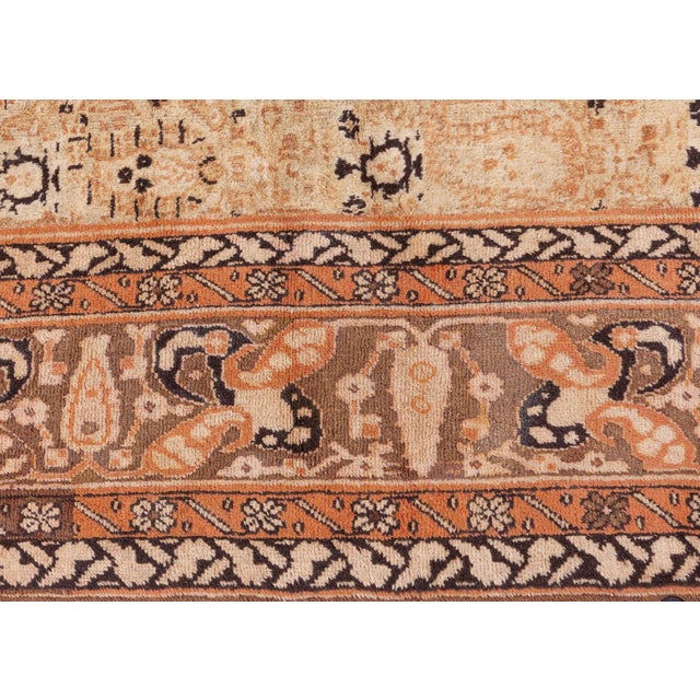 This majestic Antique Agra Rug from early 20th-century India showcases the grandeur and finesse of traditional Mughal-...