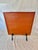 This 20th Century Leather and Cast Iron Magazine Rack dates back to the mid 1900's. The piece features a tooled brown...
