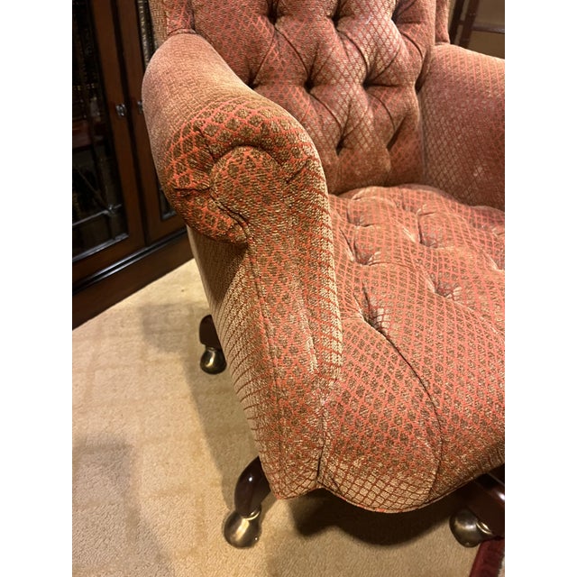 Offered is a button tufted executive chair by Hancock & Moore. This piece features an adjustable height and burnt...