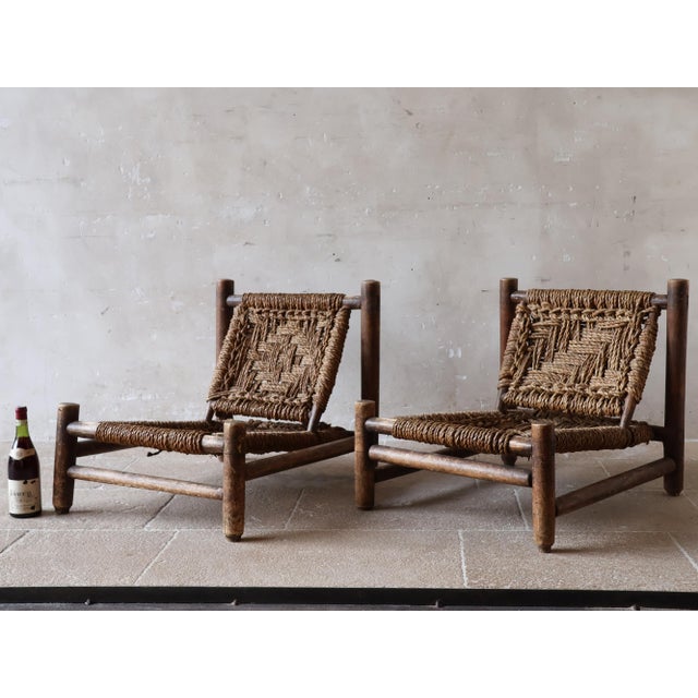 Pair of lounge chairs by the French duo Adrien Audoux & Frida Minet for Vibo Vesoul (circa 1950). The chairs embody the...