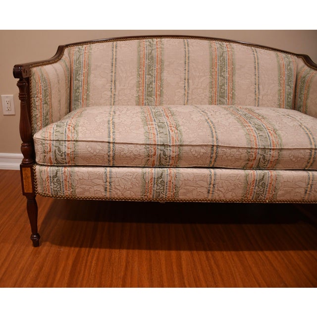We are pleased to offer this Beautiful PAIR of Sheraton style loveseats by Hickory Chair, from the 1920s. This pair is...