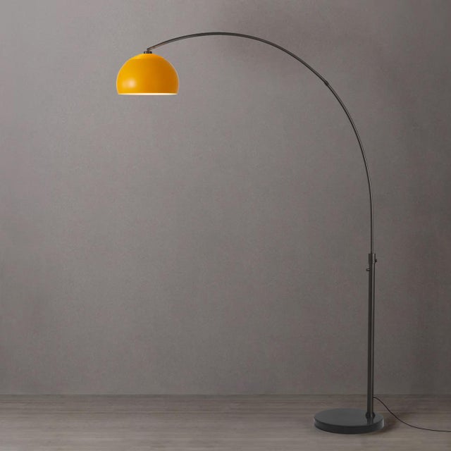 The Half Dome Arc Lamp is a Modern masterpiece by designer Peter Morelli, continuing NOVA of California's century of...