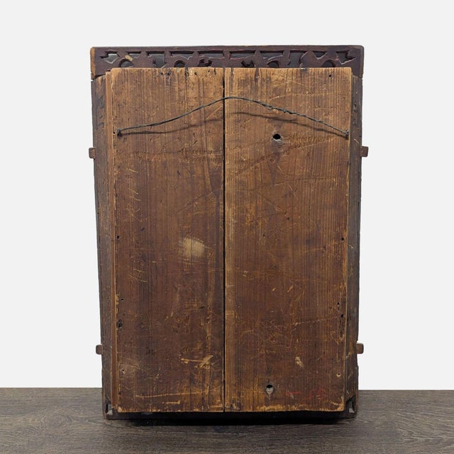 Top section of an antique screen or furniture item intricately hand carved with red lacquer and gold paint. Dimensions...