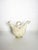 Charming French decorative pitcher modeled in the stylized form of a hen or bird. Crafted in ceramic with a soft off-white...