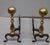 A Pair of late 19th Century Canon Ball Brass and Iron Andirons. It measures 8.5" in width 18.5" in depth, 18" in height.
