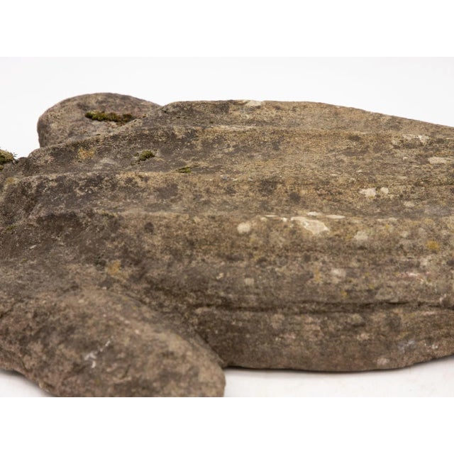 This mid-20th century vintage concrete garden ornament, originating from the United Kingdom, takes the form of a...