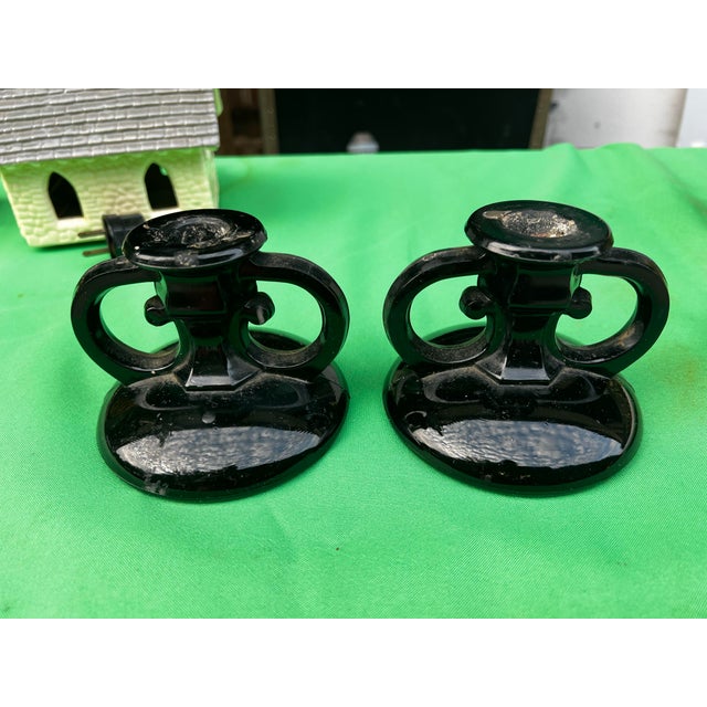 Up for consideration is a beautiful vintage pair of black milk glass candlestick holders. These would look lovely in your...