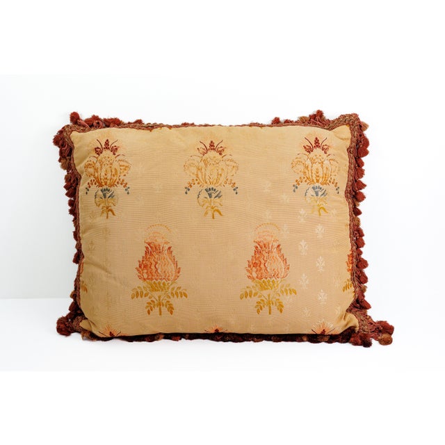 Description: Pair of peach colored pillows with tasseled fringe on border. Fabricated by David Duncan. Silk biased edges...