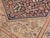 Antique hand knotted gallery carpet with an all-over repeating floral and Herati-style motif across a deep navy field and...