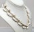 Vintage 1950s Signed Monet Goldtone & White Resin Collar Necklace For Sale In Philadelphia - Image 6 of 8