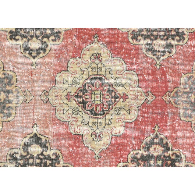 Hand-woven wool rug from Turkey's renowned Oushak region, measuring 4'11" x 11'10". Features the characteristic geometric...