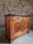 A French Louis Philippe buffet dating from around 1840–1860. The cabinet is made of walnut and burr walnut veneer and...
