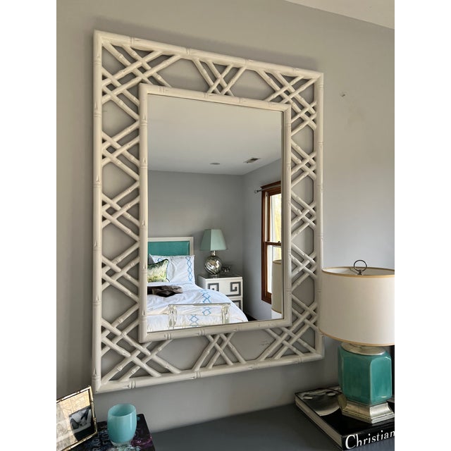White bamboo style mirror in excellent condition perfect for any space.
