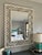 White bamboo style mirror in excellent condition perfect for any space.