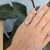 A 1-carat Ethiopian opal cabochon flashes with a full play of colour across this solid 14K yellow gold ring. Welo opals...