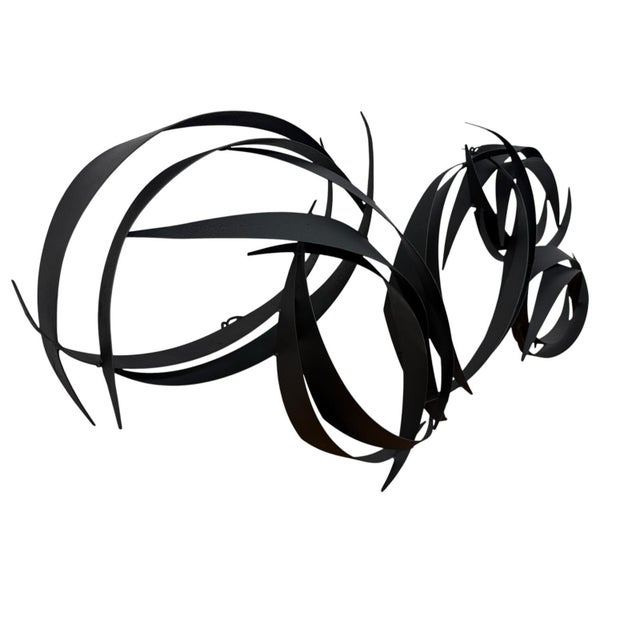 The Vintage Curtis Jere 1990's Abstract "Flight" Black Metal Wall Sculpture is a large and original piece of art measuring...