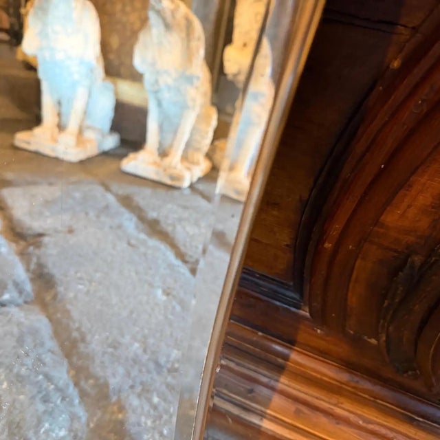 An amazing mid-century modern biscuit shaped wall mirror hand-crafted in Italy in the Fifties in the manner of Gio Ponti...