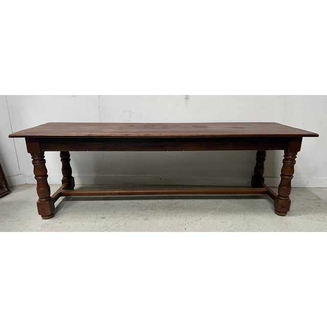 Large solid beechwood farmhouse table Four baluster legs joined by a stretcher One drawer at the end of the table Good...