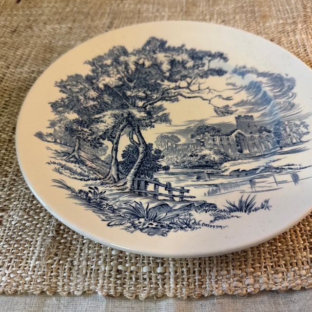Bring classic English charm to your home with this beautifully detailed “Countryside” decorative plate by Wedgwood &...
