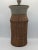 The product is a vintage Mid-Century Modern style ribbed ceramic vase with a lid, signed by the artist. This two-tone vase...