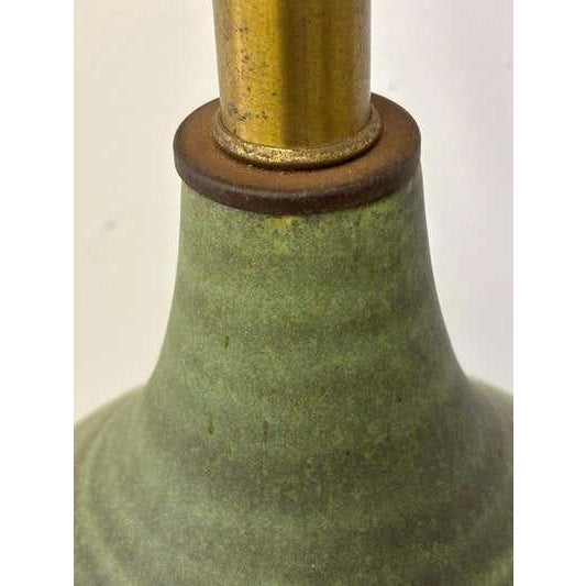 Lee Rosen for Design Technics Ceramic Table Lamp in a green Glaze. Uncommon lamp with a rare glaze color. In very nice...
