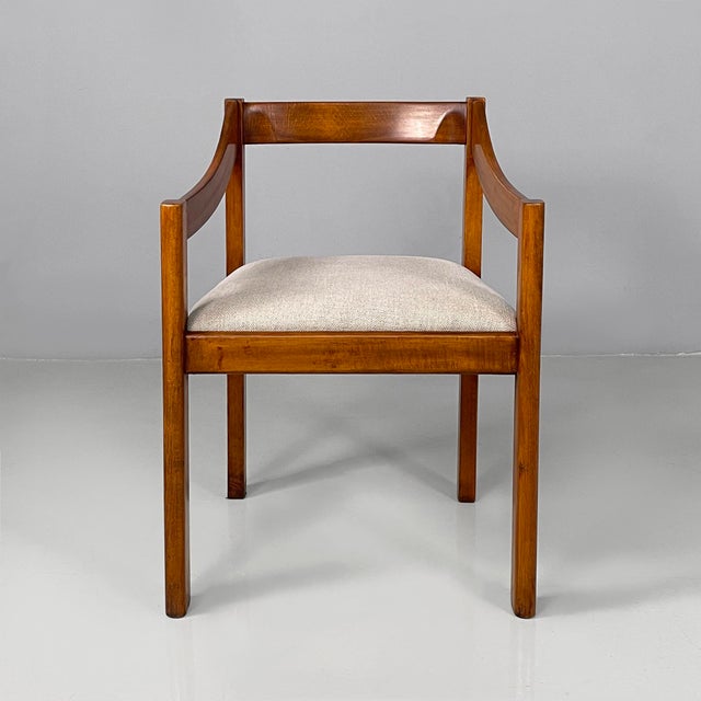 Italian modern chairs with armrest in wood and beige fabric, 1970s Set of four chairs with squared seat padded and covered...