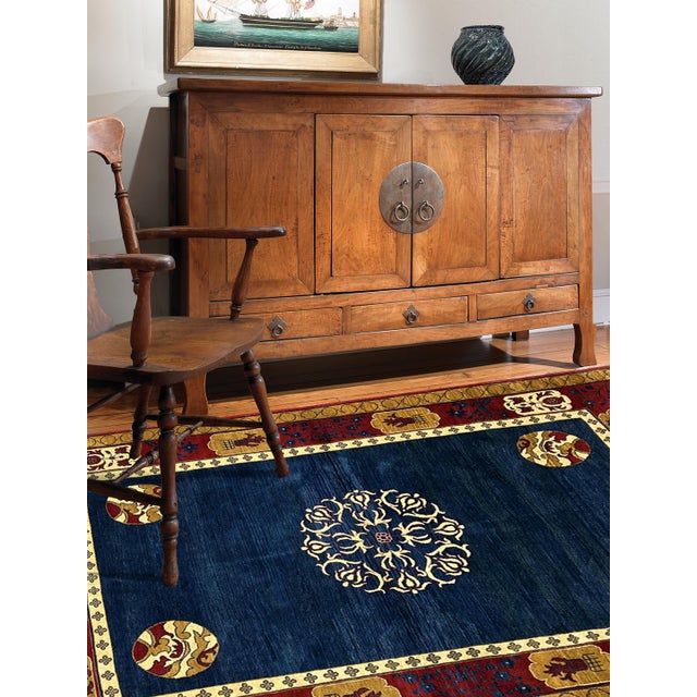 This exquisite handwoven Afghan rug blends the artistry of Central Asia with the elegance of East Asian motifs. Crafted by...