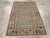 This Mid-20th century Persian Malayer rug, measuring 3' 5" x 5' 0", presents a refined example of the village weaving...