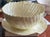 Beautifully translucent capiz shell bowl and matching under-plate crafted in the Philippines and molded into a soft petal...