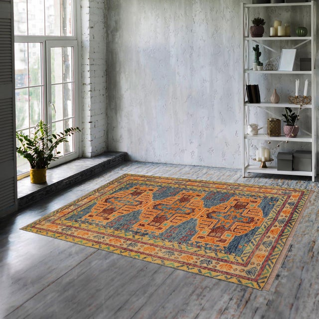 This stunning hand-knotted Afghan Balouchi rug is a captivating addition to any decor. Crafted by skilled artisans, it...