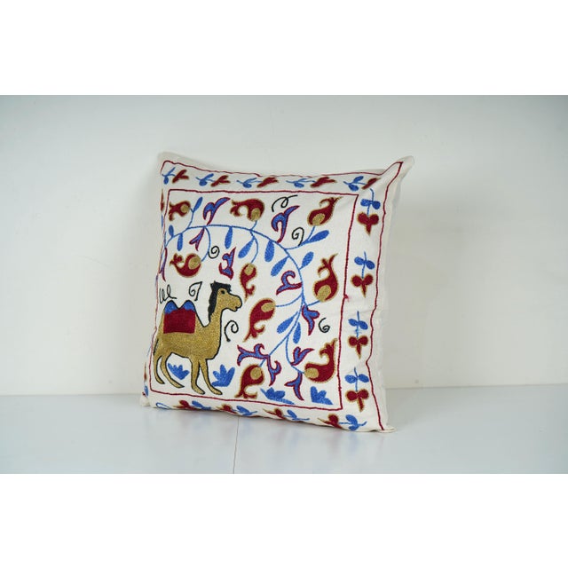 Uzbek Suzani Pillow Cover Elevate your home decor with our Turkish Suzani Pillow Cover, featuring exquisite vintage Uzbek...