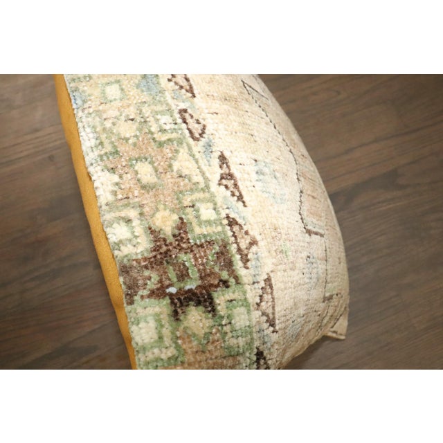 A pillow made from a vintage turkish rug