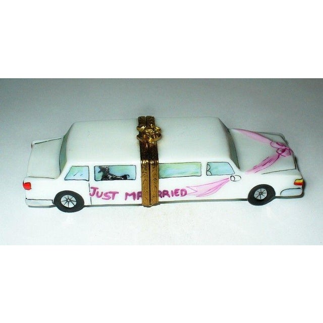The Limoges Trinket Box "Just Married” by Artoria , is a beautifully crafted collectible item that features intricate...