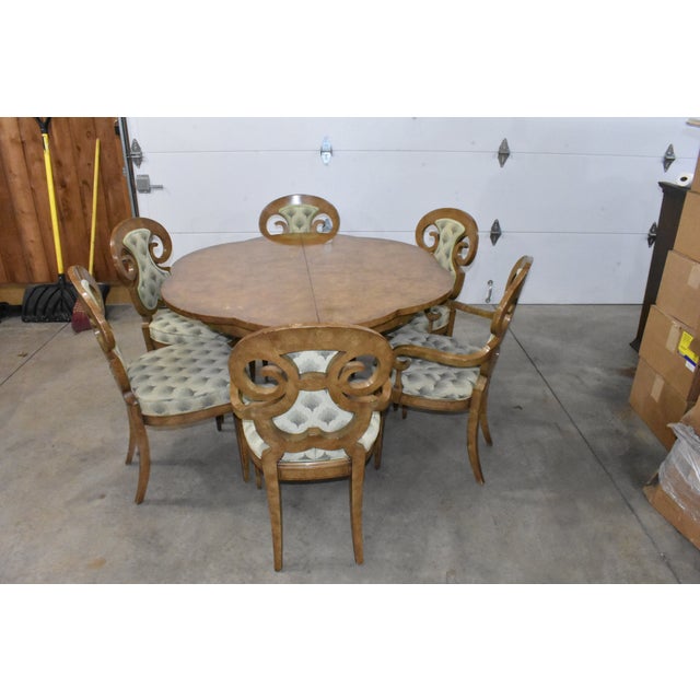 Phenomenal dining set by William Doezema for Mastercraft. Includes dining table, 3 leaves, and 6 chairs 2 of which are arm...