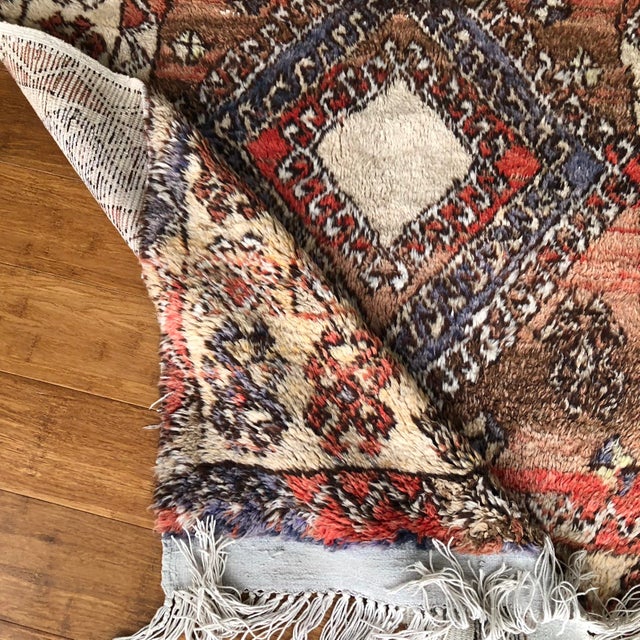A Vintage Turkish Rug from Cappadocia with Pile This exceptional vintage Turkish rug, handwoven in the Cappadocia region...