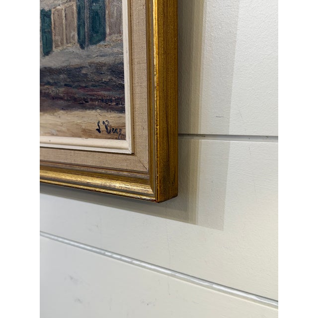 This is an amazing 19th Century English Oil of a village scene, signed by the artist. It is presented with a decorative...