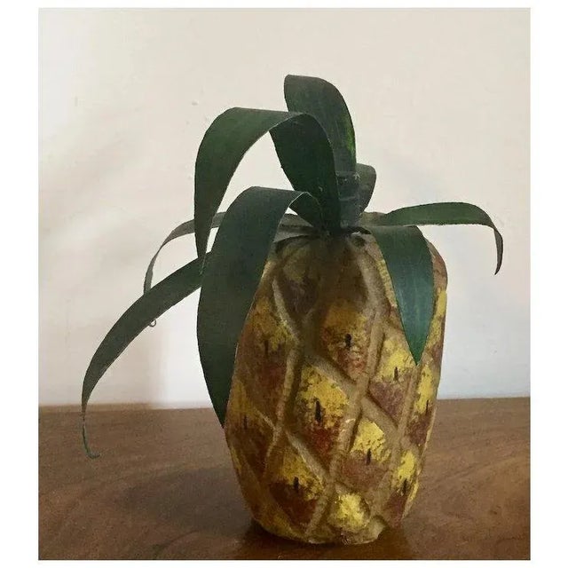 American Virginia folk art carved wood, tin and paint decorated sculpture of a pineapple. Signed Nancy Thomas. The body...