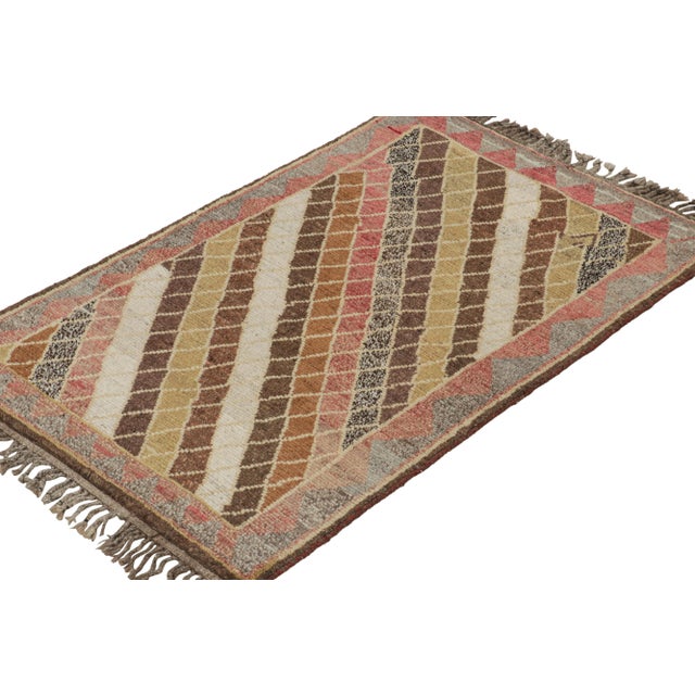 This vintage 3x5 Persian rug is a mid-century tribal piece, hand-knotted in wool circa 1950-1960. Its design plays bright...