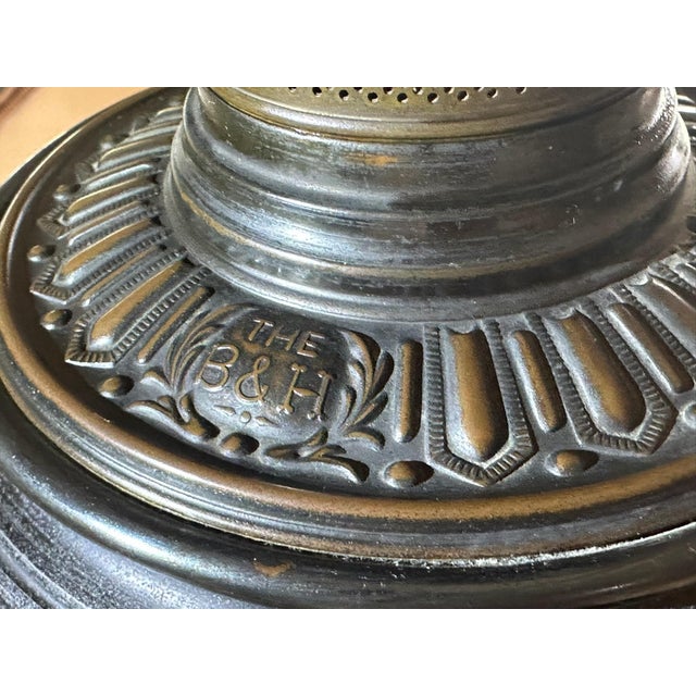 A striking late-19th-century Bradley & Hubbard piano or parlor floor lamp featuring exceptionally elaborate cast-metal...