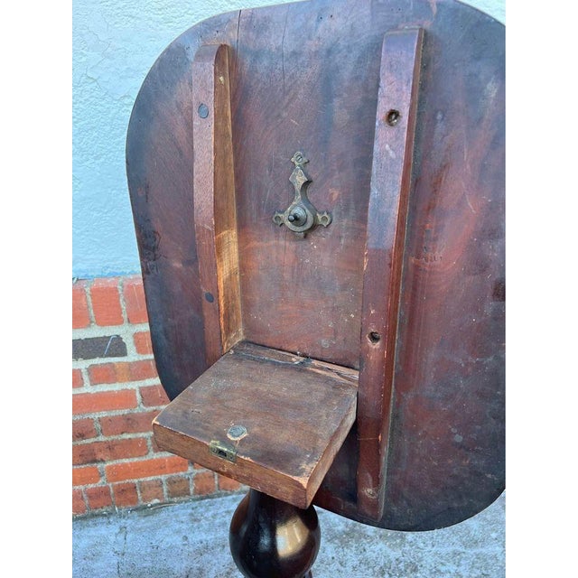 Antique 19th Century Regency Style Tilt-Top Tea Table Solid wood, well carved details Sturdy with tripod legs Approximate...