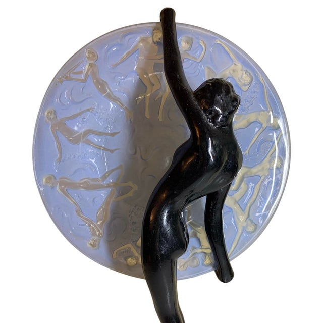 Art Deco Sarsaparilla glass moon lamp of a Frankart design featuring a nude woman nymph in black color with a light blue-...