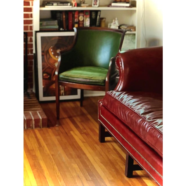 Offered in the style of Hickory Chair Co. (maker unverified). A midcentury club chair with real stories to tell. Green...