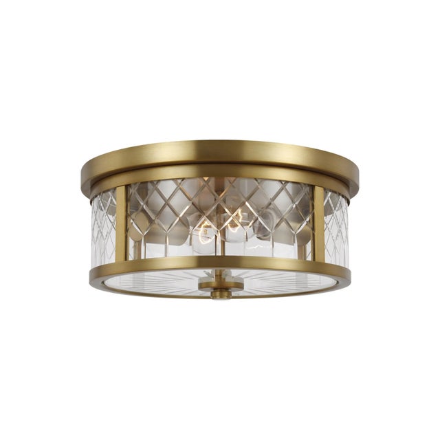 Finding inspiration from patterns, the AH by Alexa Hampton Alec two light flush mount in the burnished brass finish lend a...
