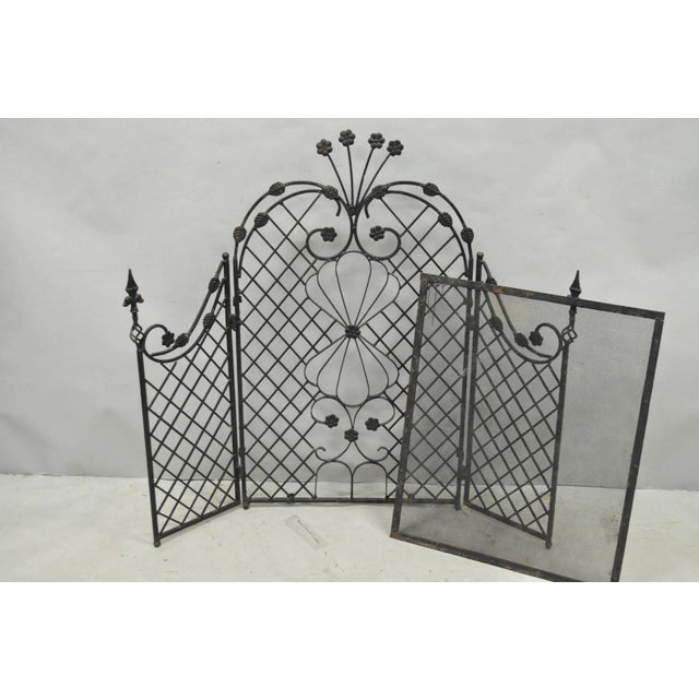 Antique Gothic Arts & Crafts Wrought Iron Scrolling Folding Fireplace Screen with Removable Screen. Circa Early 20th...