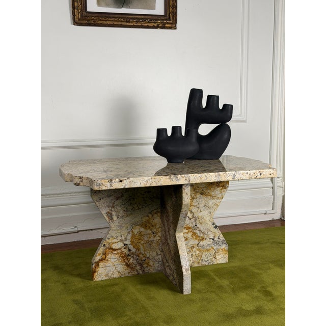 This three-part Vintage Postmodern coffee table pairs a uniquely shaped rectangular top with a genius two-piece cross-...