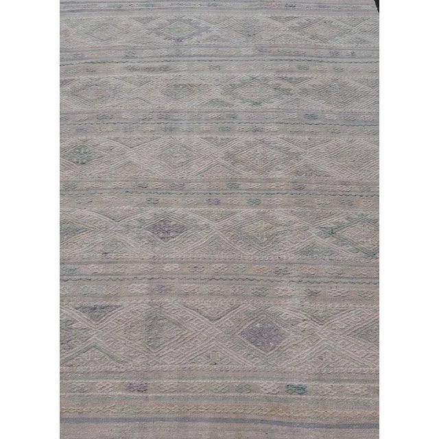 Measures: 5'5 x 8'1 Vintage Turkish Flat-Weave Kilim with Stripes and Embroideries With Gray-Green. Keivan Woven Arts /...