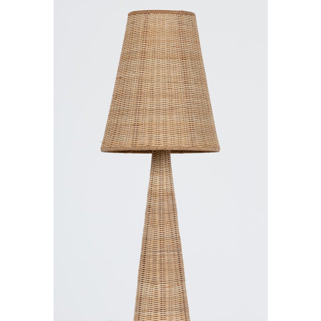 Merging the organic materiality of rattan wicker with a fashion-forward frame, Fair Haven masters the grand millennial...