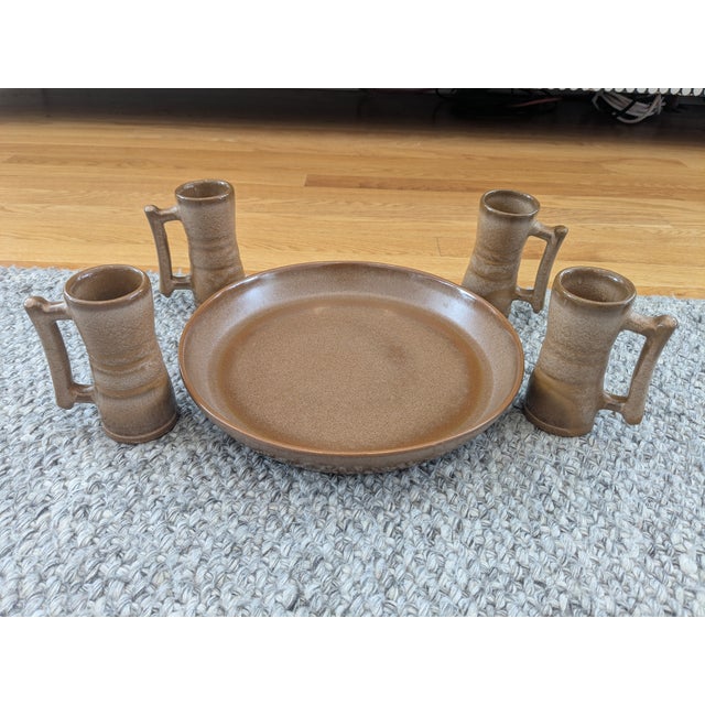 Frankoma lot of four brown espresso cups with handles plus a matching lipped serving plate. The cups are 4.5 inches tall...