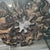 A vintage mid-century Brutalist zodiac wall mirror is a highly collectible statement piece featuring a rugged, sculptural...
