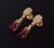 Gorgeous 18K solid gold 5.86CTS diamond and rubellite tourmaline dangle earrings. These earrings feature a very elegant...